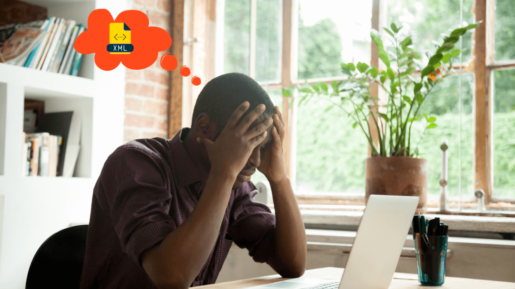 A person working on Extensible Markup Language (XML) and being frustrated by it
